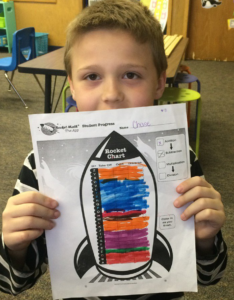 Student with Rocket Chart filled out