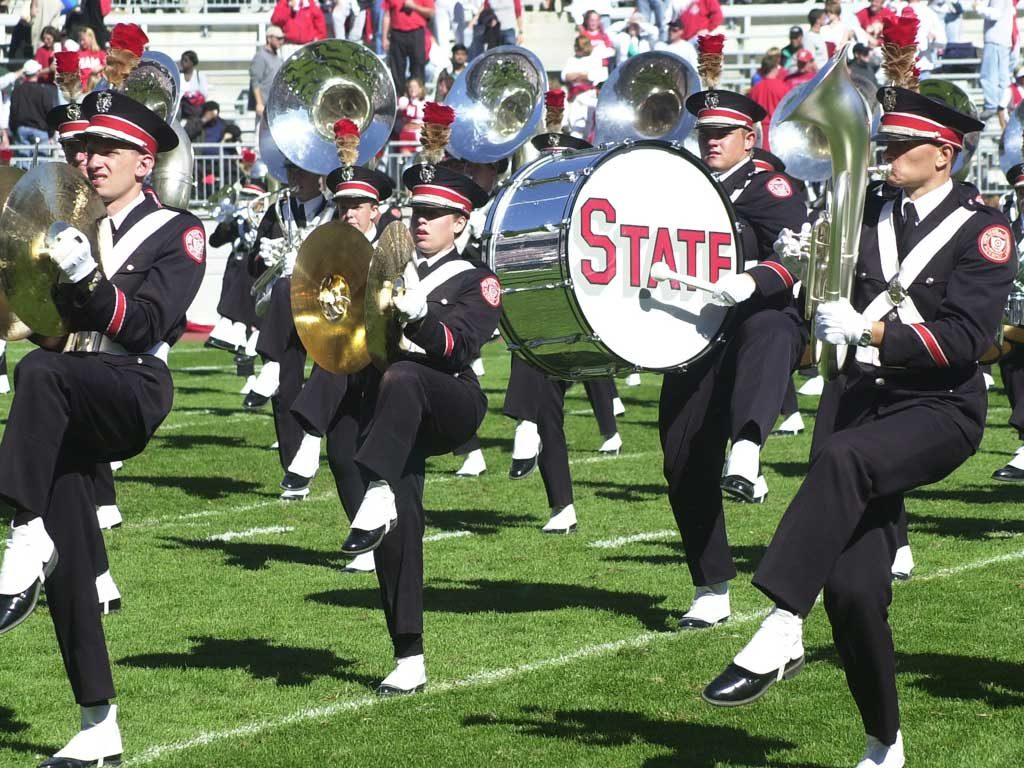 high school marching band with brass instruments and drums