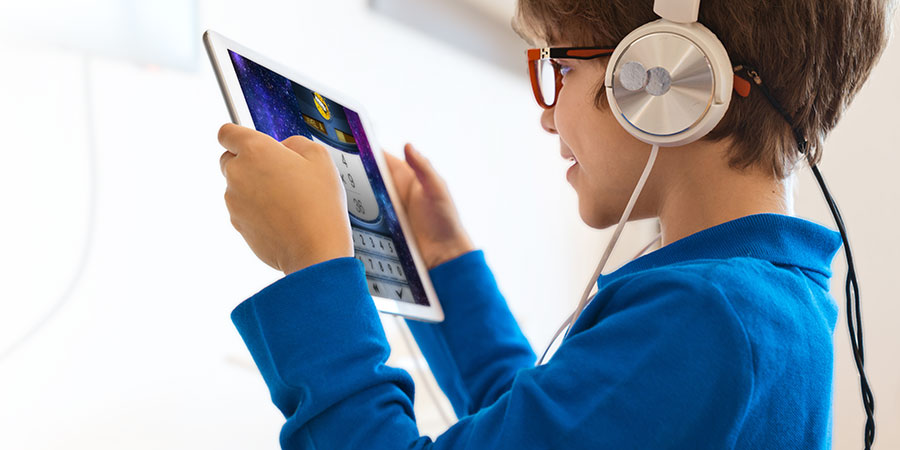 Boy playing math game
